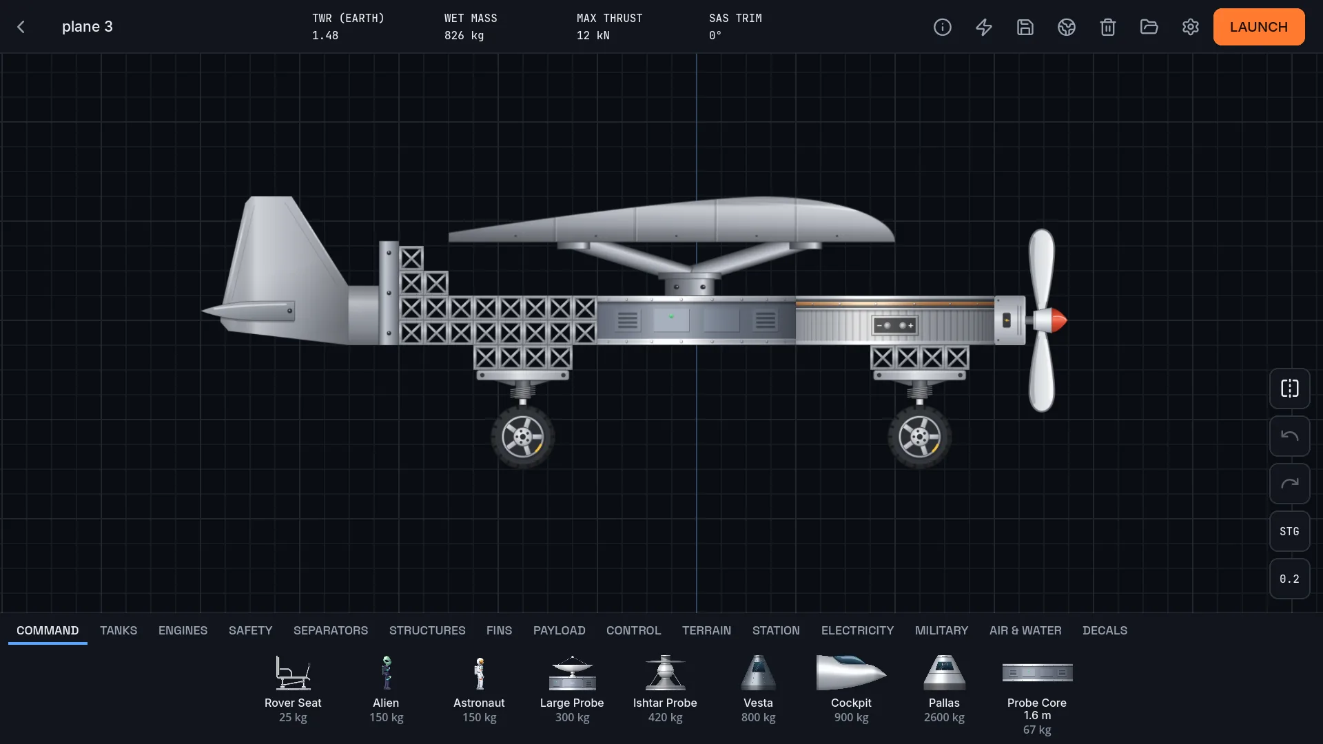 A propeller plane with wings and landing gear in the builder